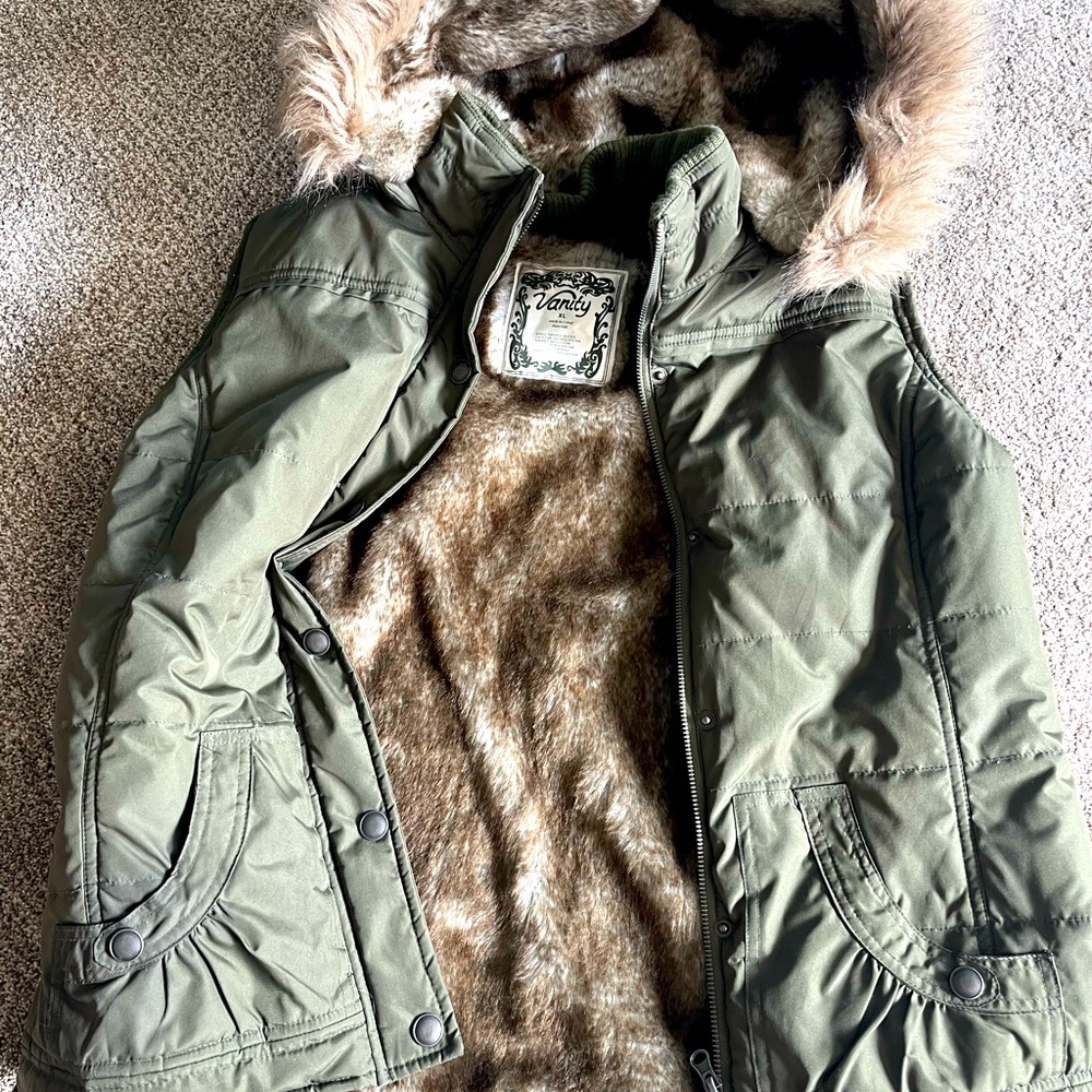 Faux fur hooded vest.  This vest is very warm!  In excellent condition!